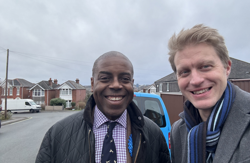 Sidney Yankson listening to residents on Manor Farm Road with Ben Spencer 