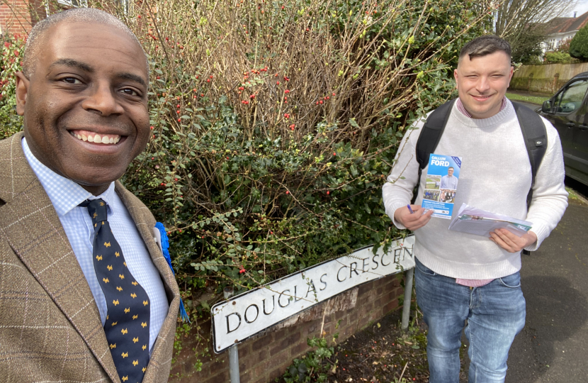 Sidney Yankson listening to residents on Douglas Crescent with local council candidate