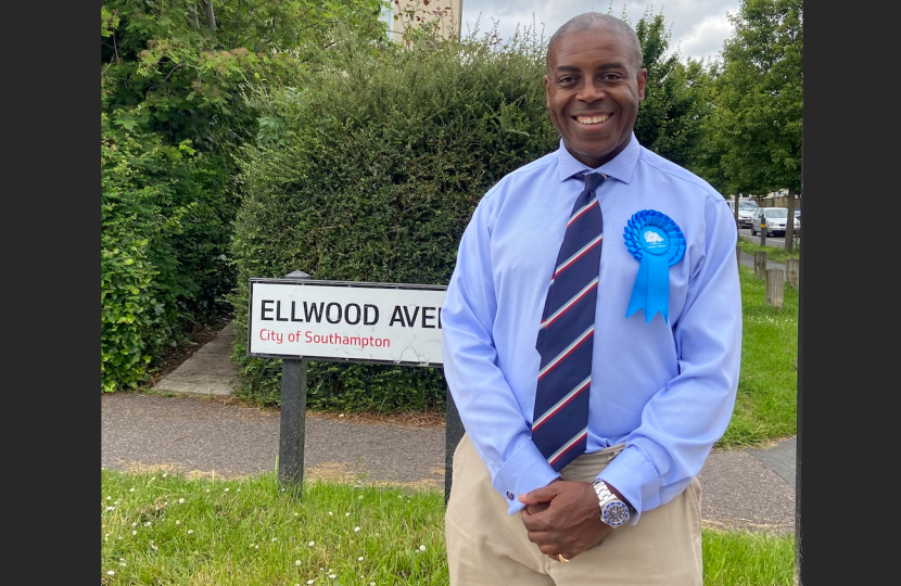 Sidney Yankson listening to residents in Thornhill discussing poor council services