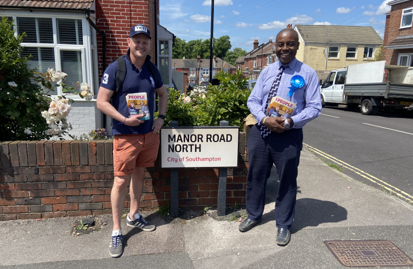 Sidney Yankson listening to residents about the general election in Peartree with Scott Davis