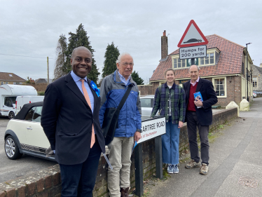 Sidney Yankson listening to residents on Peartree Avenue