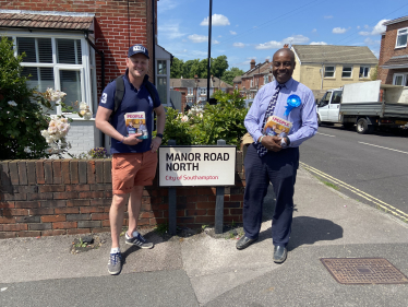 Sidney Yankson listening to residents about the general election in Peartree with Scott Davis