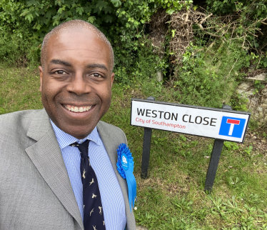 Sidney Yankson listening to residents in Woolston who were congratulating Sidney for helping Rob Stead winning a council seat from Labour