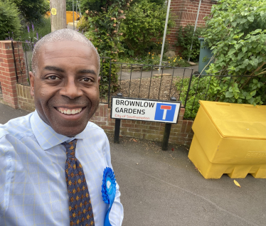 Sidney Yankson listening to residents in Peartree about the environment