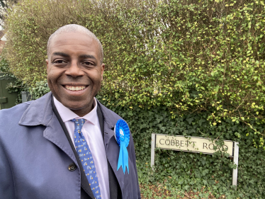 Sidney Yankson listening to residents on Cobbett Road